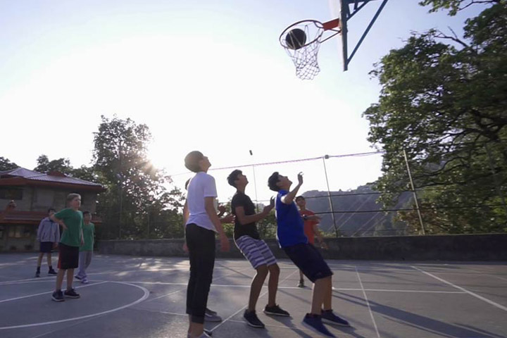 Playing basketball at Ridgewood Field